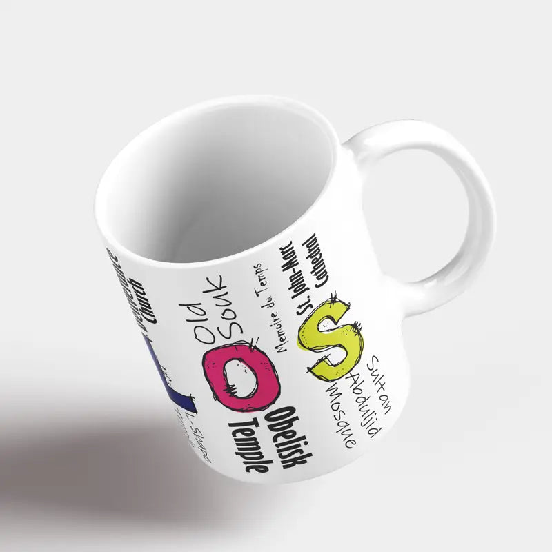 White mug with colorful text and symbols on a white background