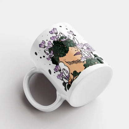 motivational mug quote for women with a woman portrait sketched with cyclamen flowers. A gift mug for women on women's international day