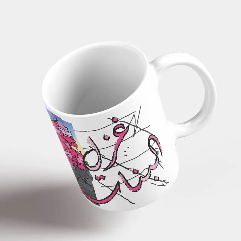 Arabic calligraphy mug of Ghazel el banet in pcolorful pink font with black outline, as Lebanese mug