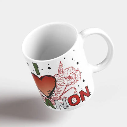 White mug with floral design and text on a white background, Lebanese floral mug, red flower mug