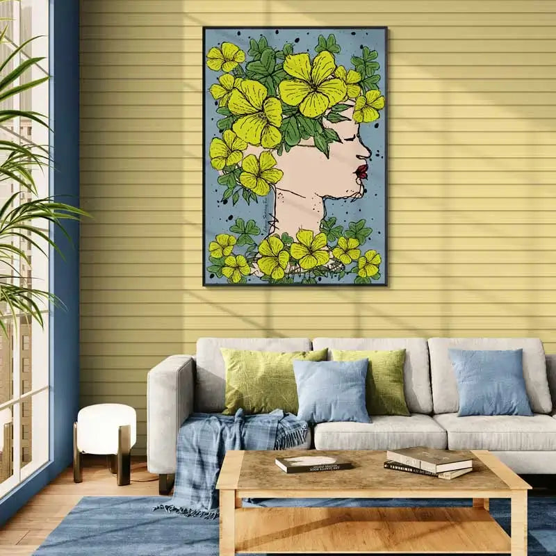 Framed artwork of a woman's profile with yellow flowers and green leaves on a blue background. Lebanese flowers poster, Lebanese poster portrait